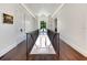 Elegant staircase with metal railings and hardwood floors at 1245 Mill Creek Rd, Bradenton, FL 34212