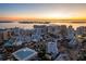 Aerial view of the city skyline at sunset, highlighting the property's location at 1335 2Nd St # 301, Sarasota, FL 34236