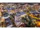 Modern condo building in vibrant city setting at night at 1335 2Nd St # 301, Sarasota, FL 34236