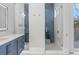 Spa-like bathroom with herringbone tile shower and modern vanity at 1335 2Nd St # 301, Sarasota, FL 34236