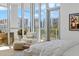 Main bedroom with city views and access to a private balcony at 1335 2Nd St # 301, Sarasota, FL 34236