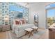 Relaxing bedroom with tropical wallpaper and private balcony at 1335 2Nd St # 301, Sarasota, FL 34236