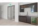 Modern common area with kitchenette and beverage center at 1335 2Nd St # 301, Sarasota, FL 34236