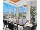 Bright common area with large table and city views at 1335 2Nd St # 301, Sarasota, FL 34236