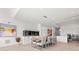 Bright dining room with large aquarium and hardwood floors at 1335 2Nd St # 301, Sarasota, FL 34236
