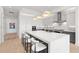 Modern kitchen with large island and white cabinets at 1335 2Nd St # 301, Sarasota, FL 34236
