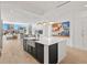Modern kitchen with farmhouse sink and white cabinetry at 1335 2Nd St # 301, Sarasota, FL 34236