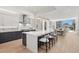 Open concept kitchen with large island and dark cabinets at 1335 2Nd St # 301, Sarasota, FL 34236