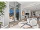 Living area with access to balcony and city views at 1335 2Nd St # 301, Sarasota, FL 34236