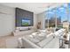 Modern living room with fireplace and city views at 1335 2Nd St # 301, Sarasota, FL 34236