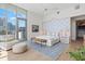 Main bedroom with a comfortable sitting area and access to a private balcony at 1335 2Nd St # 301, Sarasota, FL 34236