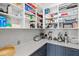 Well-organized pantry with ample shelving and modern cabinetry at 1335 2Nd St # 301, Sarasota, FL 34236