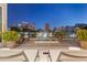 Relaxing rooftop pool and spa with city views and ample seating at 1335 2Nd St # 301, Sarasota, FL 34236
