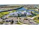 Aerial view of community clubhouse with pool and sports facilities at 15344 Serene Shores Loop, Bradenton, FL 34211