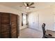 Spacious bedroom with ample closet space and a desk area at 17921 Canopy Pl, Bradenton, FL 34211