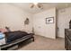 Bedroom with a twin bed, dresser, and closet at 17921 Canopy Pl, Bradenton, FL 34211