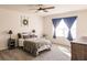 Cozy bedroom with a queen bed, nightstands, and a dresser at 17921 Canopy Pl, Bradenton, FL 34211