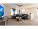 Comfortable living area with sectional sofa and large TV at 17921 Canopy Pl, Bradenton, FL 34211