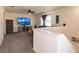 Spacious loft area, perfect for a home theater or office, with large TV and comfortable seating at 17921 Canopy Pl, Bradenton, FL 34211