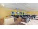 Relaxing pool area with tables, chairs, and a kitchenette at 17921 Canopy Pl, Bradenton, FL 34211