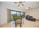 Dining area with sliding doors to balcony at 1823 Settlers Dr # A-5, Nokomis, FL 34275