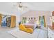 Relaxing main bedroom with high ceilings and stylish decor at 220 Ciboa Ave, North Port, FL 34287