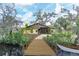 Wooden dock extending over the water, offering access to the waterway at 220 Ciboa Ave, North Port, FL 34287