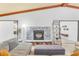 Stone fireplace with a modern mantel and surrounding shelving at 220 Ciboa Ave, North Port, FL 34287