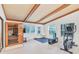 Home gym with wooden flooring, exercise equipment, and a sauna at 220 Ciboa Ave, North Port, FL 34287