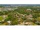 Aerial view showcasing home's secluded setting at 2807 Country River Dr, Parrish, FL 34219