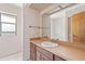 Bathroom with vanity, sink, and mirror at 2807 Country River Dr, Parrish, FL 34219