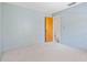 Empty bedroom with light walls and door at 2807 Country River Dr, Parrish, FL 34219