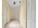 Clean and simple entryway with tiled floor and built-in closets at 2807 Country River Dr, Parrish, FL 34219