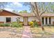 Front entrance and landscaping with a walkway at 2807 Country River Dr, Parrish, FL 34219