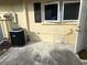 AC unit and exterior access with window and door at 390 301 W Blvd # 30B, Bradenton, FL 34205