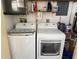 Stackable LG washer and dryer in a well-lit laundry room at 390 301 W Blvd # 30B, Bradenton, FL 34205