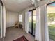 Cozy sunroom with sliding glass doors leading to the backyard at 6246 Draw Ln # 12, Sarasota, FL 34238