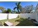Private backyard with grass and seating at 711 S Palm Ave # 203, Sarasota, FL 34236