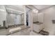 Elegant bathroom with dual sinks, modern vanity, and walk-in shower at 711 S Palm Ave # 203, Sarasota, FL 34236