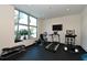 Bright fitness center with large windows and equipment at 711 S Palm Ave # 203, Sarasota, FL 34236