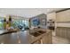Modern kitchen with stainless steel appliances and a large island at 711 S Palm Ave # 203, Sarasota, FL 34236