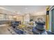 Open concept living room with comfortable seating and modern decor at 711 S Palm Ave # 203, Sarasota, FL 34236
