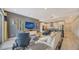 Modern living room with open floor plan and kitchen view at 711 S Palm Ave # 203, Sarasota, FL 34236