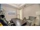 Modern home office with a desk, chair, and side table at 711 S Palm Ave # 203, Sarasota, FL 34236