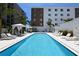 Resort-style pool with plenty of lounge chairs at 711 S Palm Ave # 203, Sarasota, FL 34236