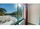 Bedroom window view overlooking a refreshing community pool at 711 S Palm Ave # 203, Sarasota, FL 34236