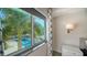 View from bedroom window showcasing resort-style pool at 711 S Palm Ave # 203, Sarasota, FL 34236