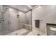 Modern shower with glass enclosure and built-in seat at 711 S Palm Ave # 203, Sarasota, FL 34236