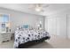 Main bedroom with king-size bed, nightstands and ceiling fan at 7402 9Th W Ave, Bradenton, FL 34209