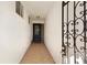 Inviting entryway with tiled flooring and an ornate wrought-iron gate at 7402 9Th W Ave, Bradenton, FL 34209